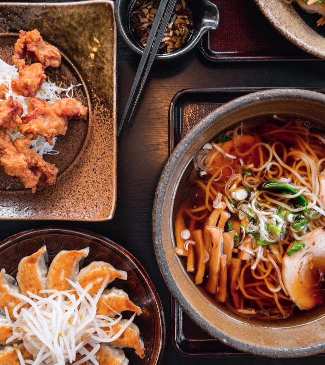 Japanese meal with ramen, gyoza, and karaage